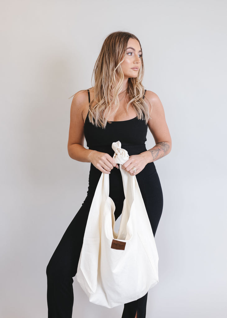 Tote bag with clearance sling